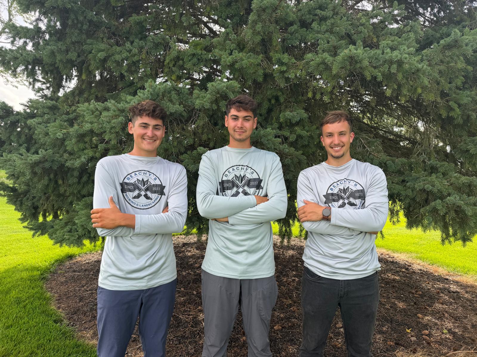 Coleman Beachy, Braden Beachy and Ty Hostetler — the Beachy Mowing & Landscaping crew